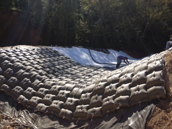 Articulating-Block-Mats-ditch Installed articulating block mats in ditch