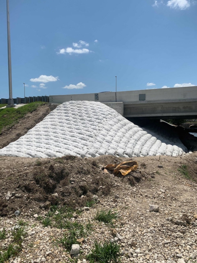 pumped-in-place-AB-mat-2-768×1024 pumped in place Articulating block mat on a underpass